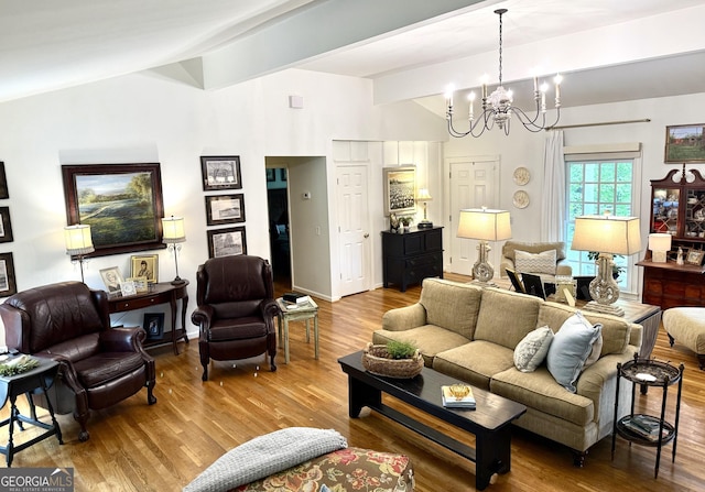 1055 E Hermitage Rd NE, Rome, GA 30161 - living room featuring a chandelier and wood finished floors
