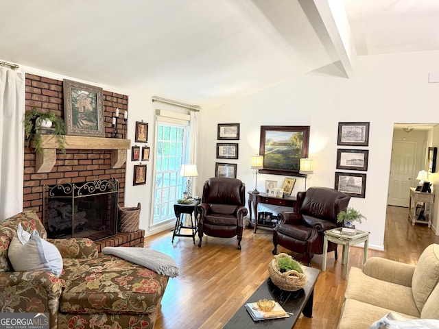 1055 E Hermitage Rd NE, Rome, GA 30161 - living area featuring wood finished floors and a brick fireplace