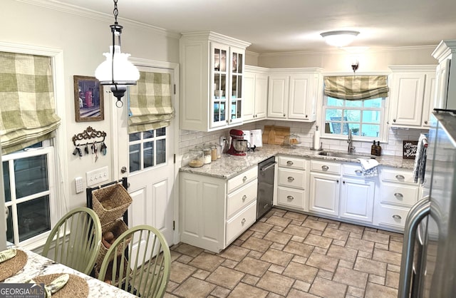 1055 E Hermitage Rd NE, Rome, GA 30161 - kitchen featuring white cabinetry, decorative backsplash, stainless steel dishwasher, freestanding refrigerator, and ornamental molding