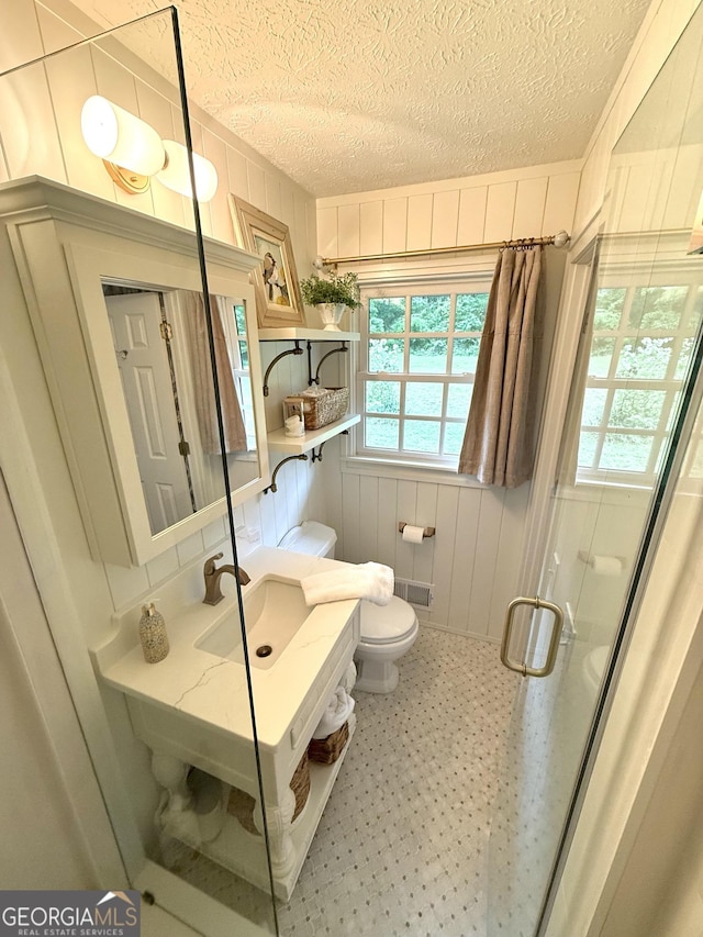 1055 E Hermitage Rd NE, Rome, GA 30161 - full bathroom featuring a textured ceiling, a stall shower, and wooden walls
