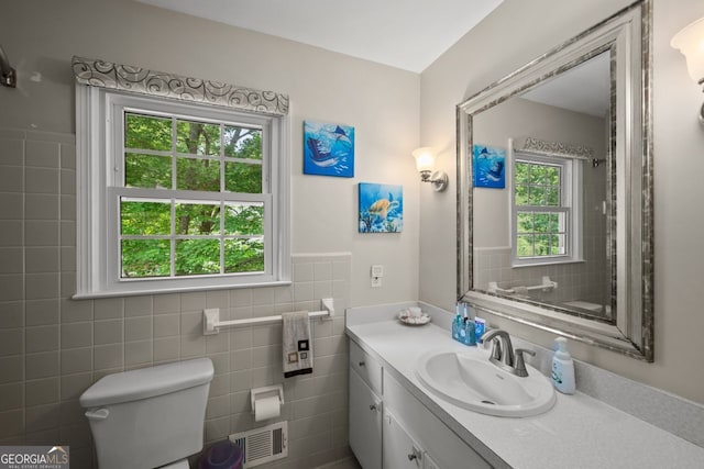 3912 Edenton Ct, Brookhaven, GA 30319 - bathroom with vanity, tile walls, and wainscoting