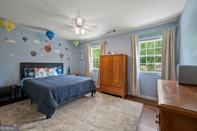 3912 Edenton Ct, Brookhaven, GA 30319 - bedroom with wood finished floors and a ceiling fan