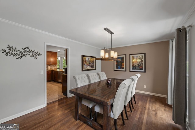 3912 Edenton Ct, Brookhaven, GA 30319 - dining space with crown molding, dark wood finished floors, and a chandelier