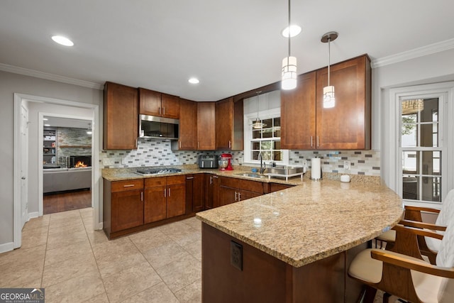 3912 Edenton Ct, Brookhaven, GA 30319 - kitchen with stainless steel appliances, a peninsula, decorative backsplash, ornamental molding, and light stone counters
