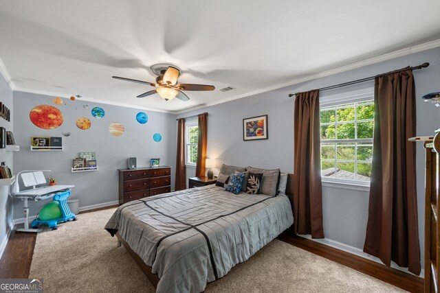 3912 Edenton Ct, Brookhaven, GA 30319 - bedroom with crown molding, wood finished floors, and a ceiling fan