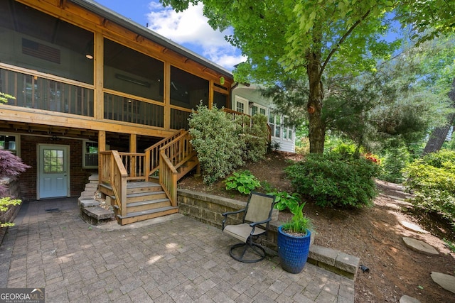 3912 Edenton Ct, Brookhaven, GA 30319 - view of patio / terrace with a sunroom and stairs