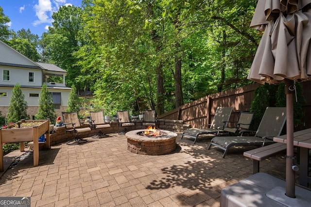 3912 Edenton Ct, Brookhaven, GA 30319 - view of patio featuring an outdoor fire pit