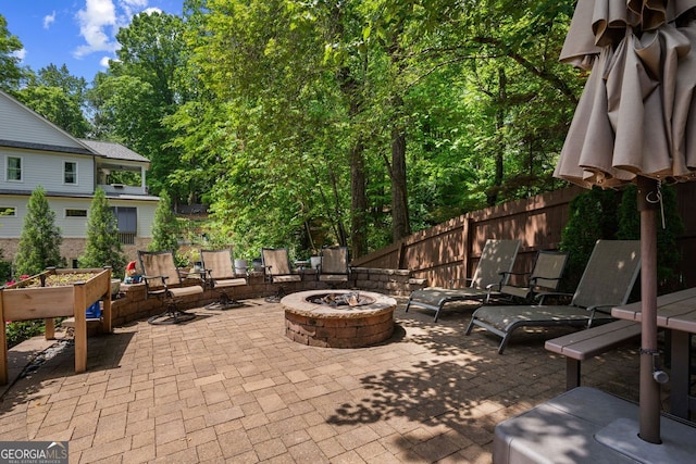 3912 Edenton Ct, Brookhaven, GA 30319 - view of patio / terrace with an outdoor fire pit