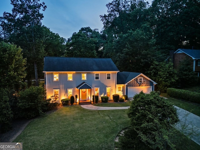 3912 Edenton Ct, Brookhaven, GA 30319 - colonial house with a garage, a front lawn, and concrete driveway