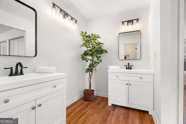 4818 Terrace Green Trce, Stone Mountain, GA 30088 - bathroom with two vanities and wood finished floors