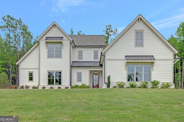 172 Forest Berry Ct Lot 100M2A, Newnan, GA 30265 - modern inspired farmhouse with a standing seam roof, a front yard, a metal roof, and roof with shingles