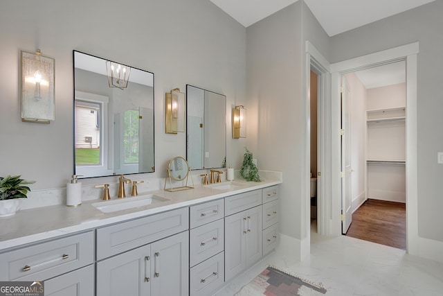 172 Forest Berry Ct Lot 100M2A, Newnan, GA 30265 - bathroom with double vanity, a walk in shower, and a spacious closet