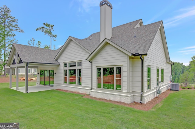 172 Forest Berry Ct Lot 100M2A, Newnan, GA 30265 - rear view of property with roof with shingles, a patio area, a lawn, and a chimney