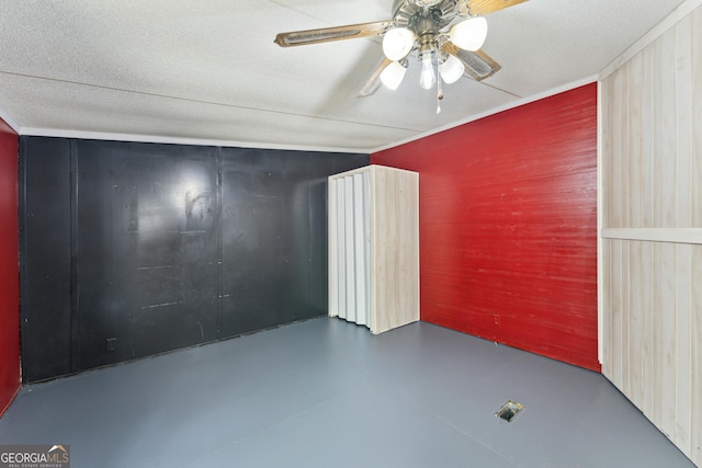 99 Conifer Dr, Guyton, GA 31312 - bonus room featuring ceiling fan, concrete floors, and wood walls