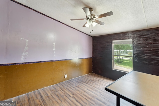 99 Conifer Dr, Guyton, GA 31312 - spare room featuring a ceiling fan, wood finished floors, and a textured ceiling
