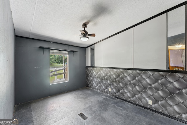 99 Conifer Dr, Guyton, GA 31312 - spare room with a ceiling fan and a textured ceiling