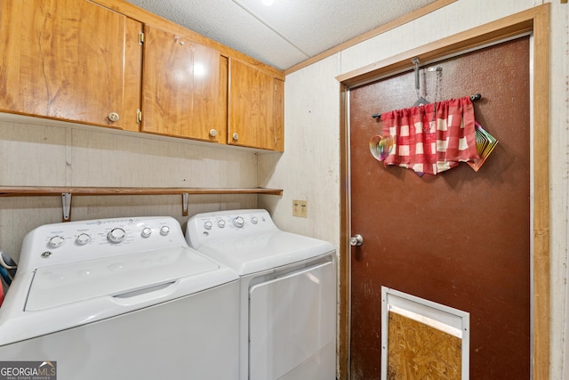 99 Conifer Dr, Guyton, GA 31312 - laundry area featuring washing machine and dryer and cabinet space