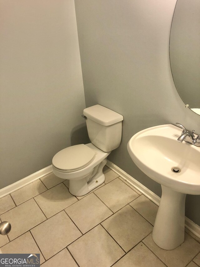 1433 Cotton Trl SW, Conyers, GA 30094 - bathroom featuring toilet and tile patterned floors