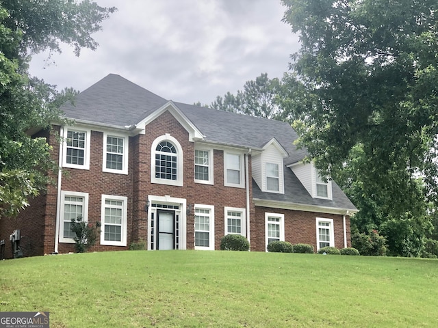 1433 Cotton Trl SW, Conyers, GA 30094 - colonial inspired home featuring brick siding and a front yard
