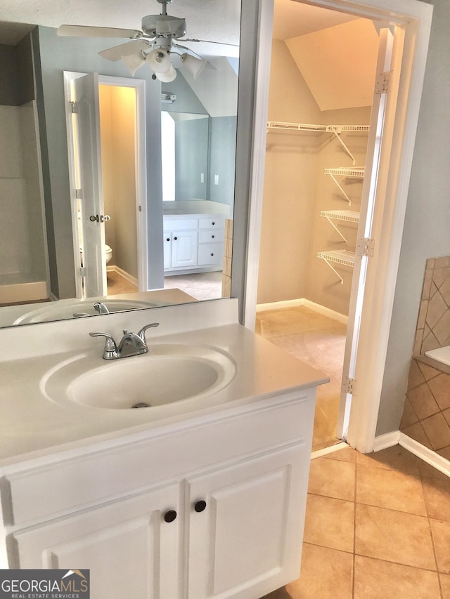 1433 Cotton Trl SW, Conyers, GA 30094 - bathroom with vanity, tile patterned floors, and ceiling fan