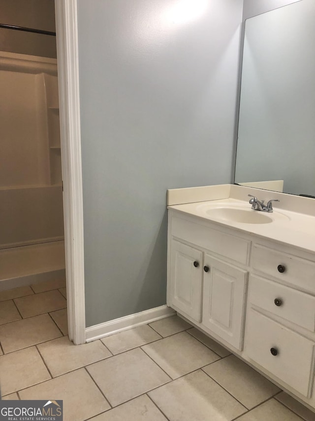 1433 Cotton Trl SW, Conyers, GA 30094 - bathroom with vanity and tile patterned flooring