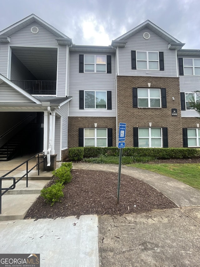 14104 Fairington Ridge Cir, Lithonia, GA 30038 - townhome / multi-family property with brick siding