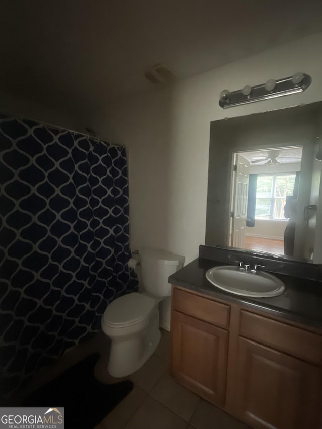 14104 Fairington Ridge Cir, Lithonia, GA 30038 - bathroom featuring vanity, tile patterned floors, and curtained shower