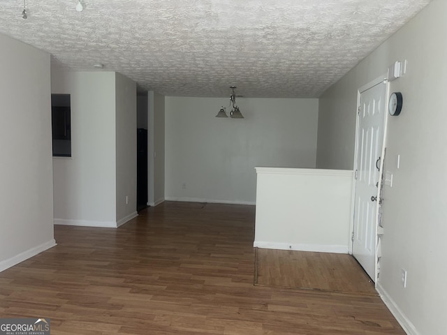 14104 Fairington Ridge Cir, Lithonia, GA 30038 - empty room featuring baseboards and wood finished floors