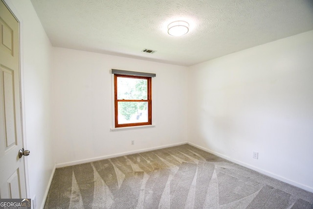 125 Point View Ct, Tyrone, GA 30290 - carpeted spare room featuring a textured ceiling and baseboards