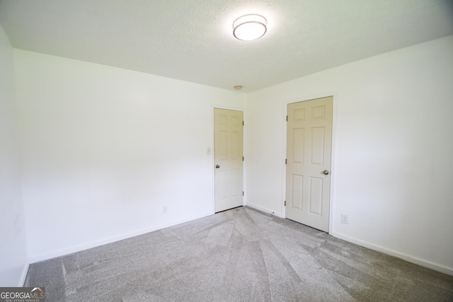 125 Point View Ct, Tyrone, GA 30290 - carpeted empty room with a textured ceiling and baseboards