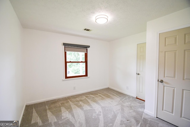 125 Point View Ct, Tyrone, GA 30290 - unfurnished room featuring carpet flooring and a textured ceiling