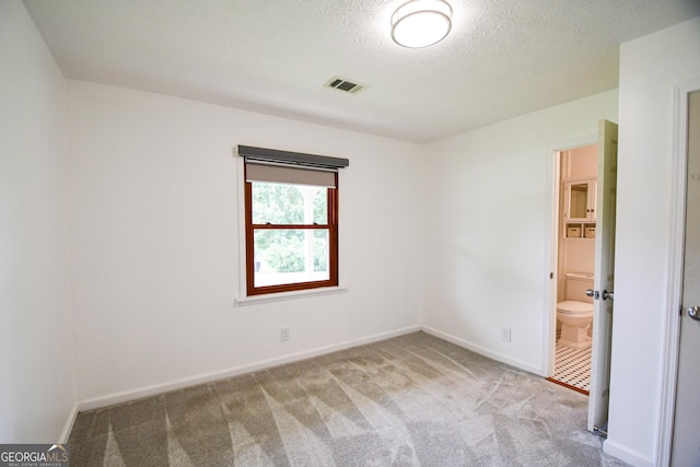 125 Point View Ct, Tyrone, GA 30290 - spare room with carpet floors and a textured ceiling