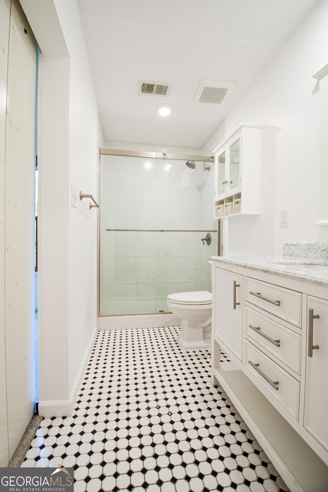 125 Point View Ct, Tyrone, GA 30290 - bathroom featuring vanity, a shower stall, tile patterned flooring, and recessed lighting