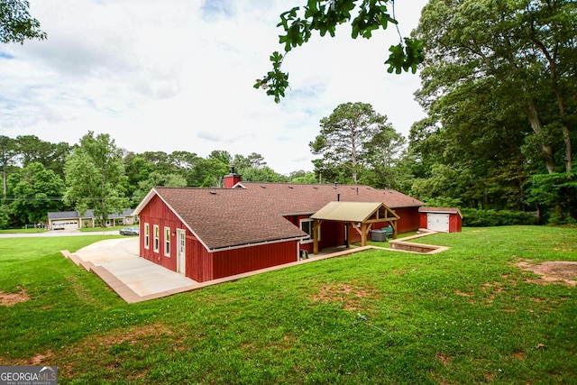 125 Point View Ct, Tyrone, GA 30290 - back of house with a lawn, a shingled roof, and a patio area