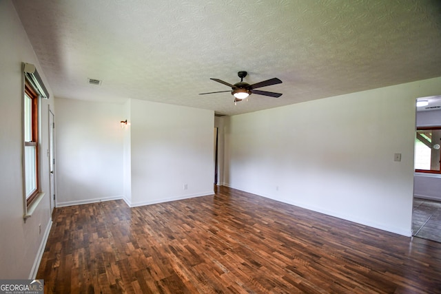 125 Point View Ct, Tyrone, GA 30290 - empty room with wood finished floors, a ceiling fan, and a textured ceiling