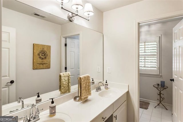 4401 Madison Woods Dr NW Unit 4401, Marietta, GA 30064 - bathroom featuring double vanity, tile patterned floors, and a chandelier