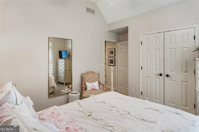 4401 Madison Woods Dr NW Unit 4401, Marietta, GA 30064 - bedroom featuring a closet and high vaulted ceiling
