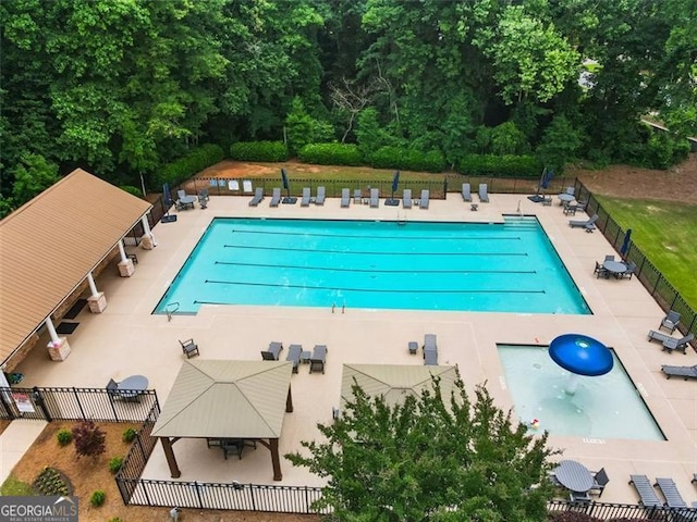 4401 Madison Woods Dr NW Unit 4401, Marietta, GA 30064 - community pool featuring a patio area