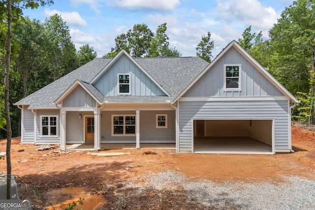 558 Holman Autry Rd, Danielsville, GA 30633 - view of front of property with roof with shingles, board and batten siding, and a garage