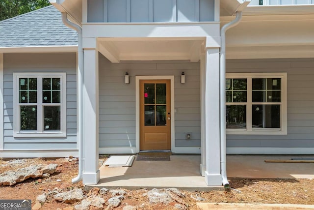558 Holman Autry Rd, Danielsville, GA 30633 - entrance to property with roof with shingles and board and batten siding
