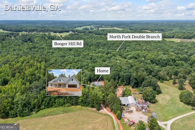 558 Holman Autry Rd, Danielsville, GA 30633 - aerial overview of property's location with a heavily wooded area and property parcel outlined