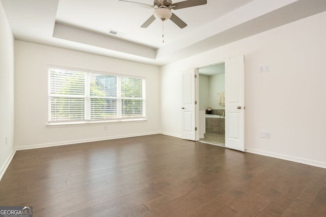 4583 Grenadine Cir, Acworth, GA 30101 - unfurnished room with a ceiling fan, a raised ceiling, and dark wood-style flooring