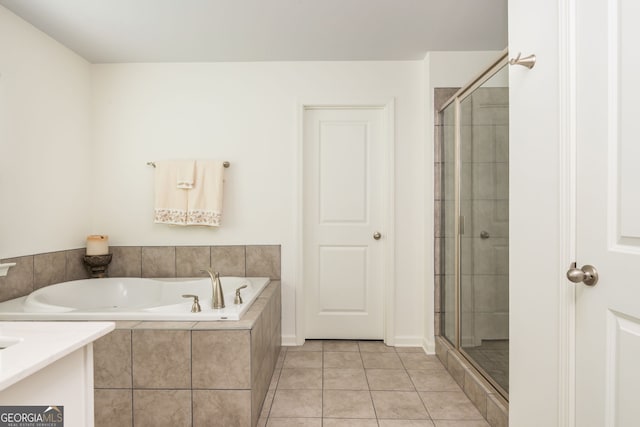 4583 Grenadine Cir, Acworth, GA 30101 - full bath with a bath, a shower stall, and tile patterned flooring