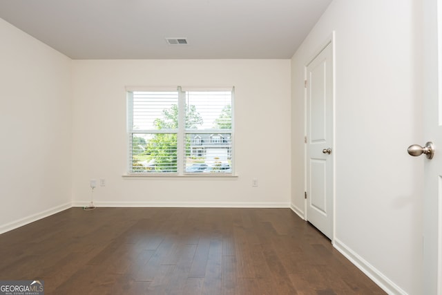 4583 Grenadine Cir, Acworth, GA 30101 - spare room featuring dark wood-style flooring and baseboards