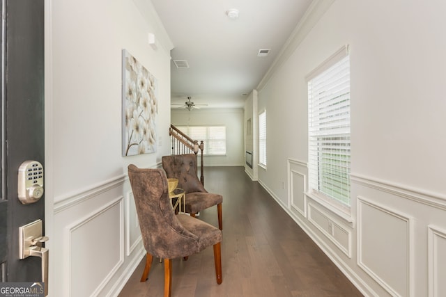 4583 Grenadine Cir, Acworth, GA 30101 - hall with a decorative wall, ornamental molding, dark wood finished floors, and wainscoting