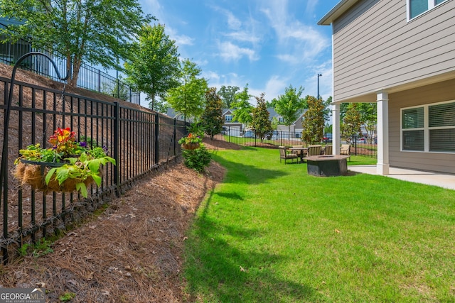 4583 Grenadine Cir, Acworth, GA 30101 - view of yard with a fire pit and a patio