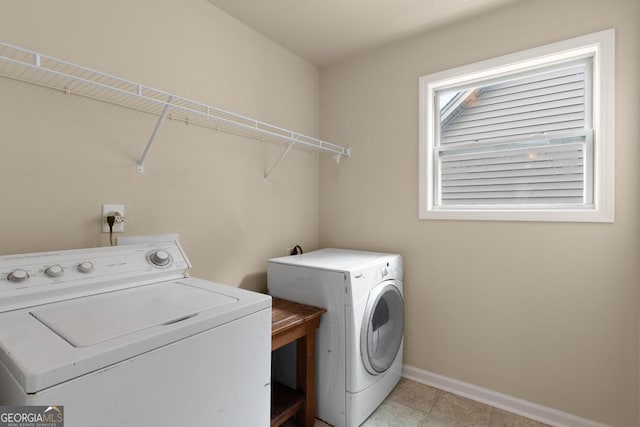 127 Kennedy Blvd, Jackson, GA 30233 - laundry area with washing machine and dryer and light tile patterned floors