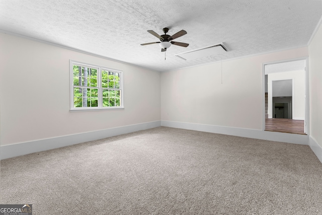 223 Pinehaven Dr, Lagrange, GA 30240 - spare room with attic access, a ceiling fan, a textured ceiling, and carpet floors