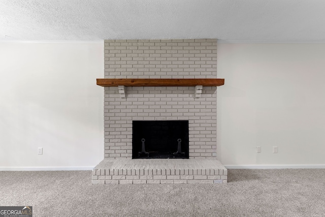 223 Pinehaven Dr, Lagrange, GA 30240 - detailed view of carpet flooring, a textured ceiling, crown molding, and a fireplace