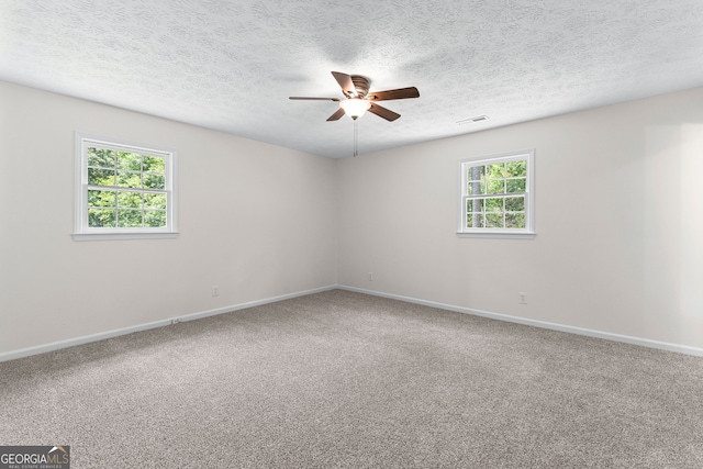 223 Pinehaven Dr, Lagrange, GA 30240 - empty room with a ceiling fan, carpet floors, and a textured ceiling